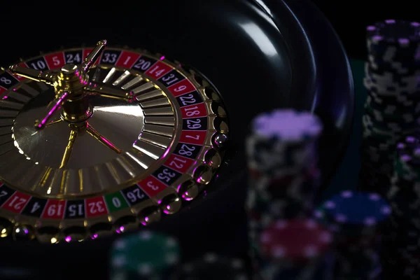Close-up of live roulette wheel with betting layout visible, showing the betting chip interface on laju303 platform